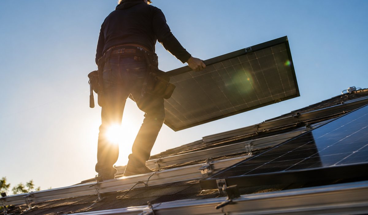 Installing solar panels on a roof